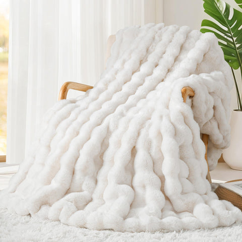 Touchat Luxury faux rabbit fur throw close-up reveals plush texture for cozy warmth.