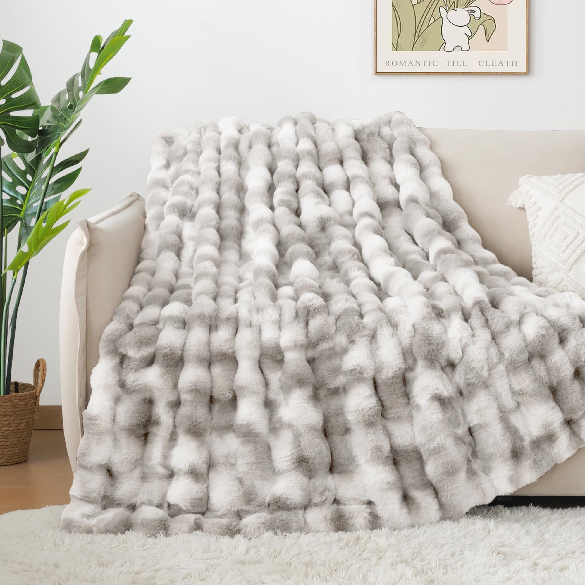 Touchat soft grey throw on sofa adding cozy decor and style