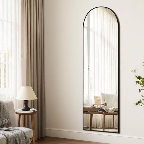 Trahome black aluminum arch mirror with hidden stand for flexible placement.