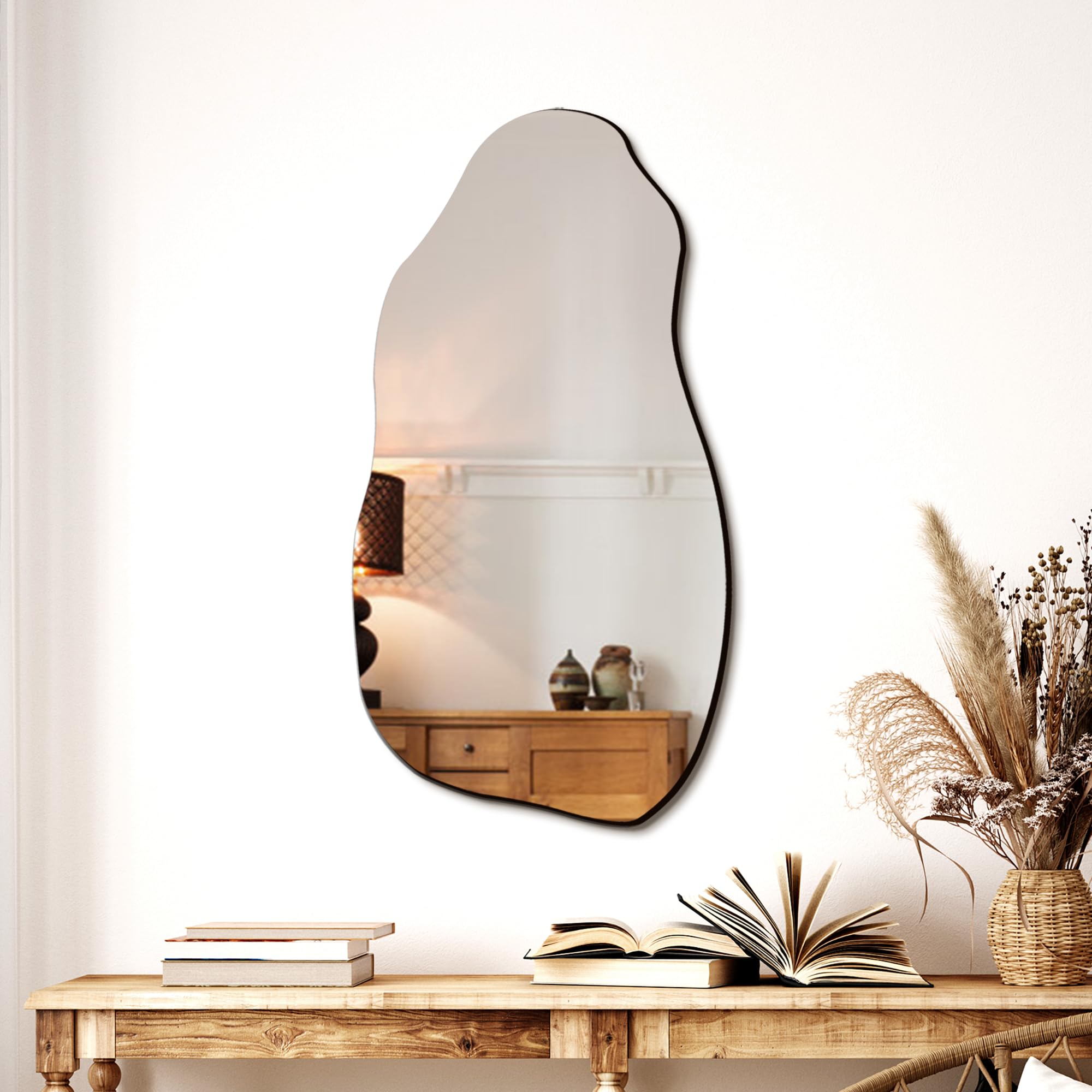 TRAHOME irregular mirror front view highlights a contemporary silhouette for living rooms.