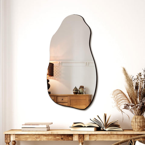 TRAHOME irregular mirror front view highlights a contemporary silhouette for living rooms.