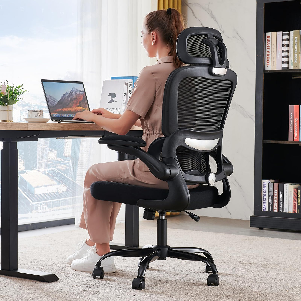 TRALT office chair with lumbar support for extended computer work.