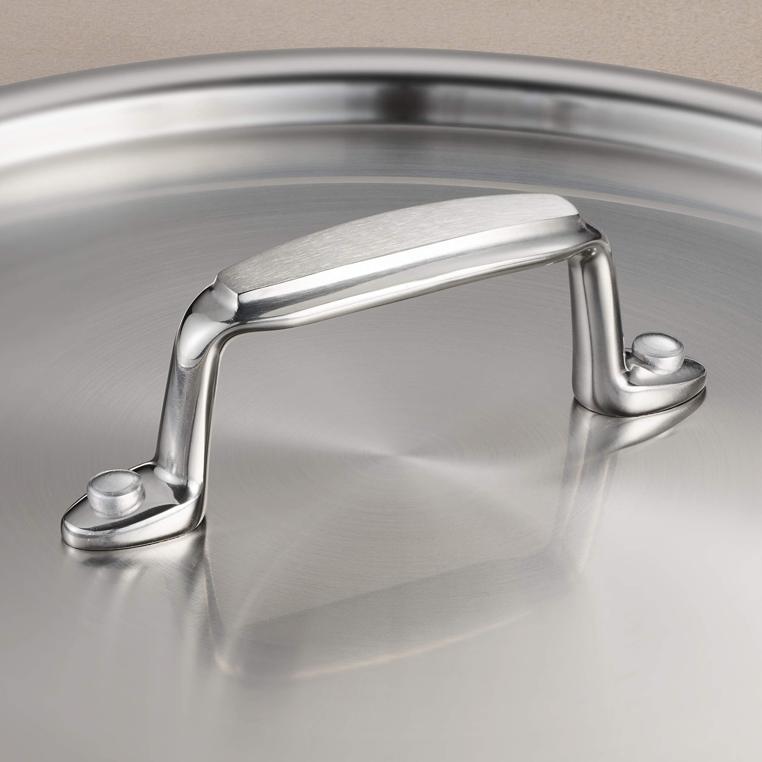 Riveted handles on Tramontina Gourmet stock pot for stable grip