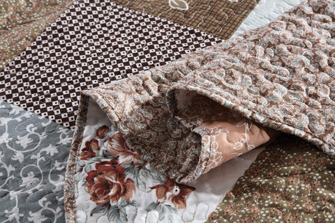 Travan pillow-shams-queen-size coordinate with quilt look.