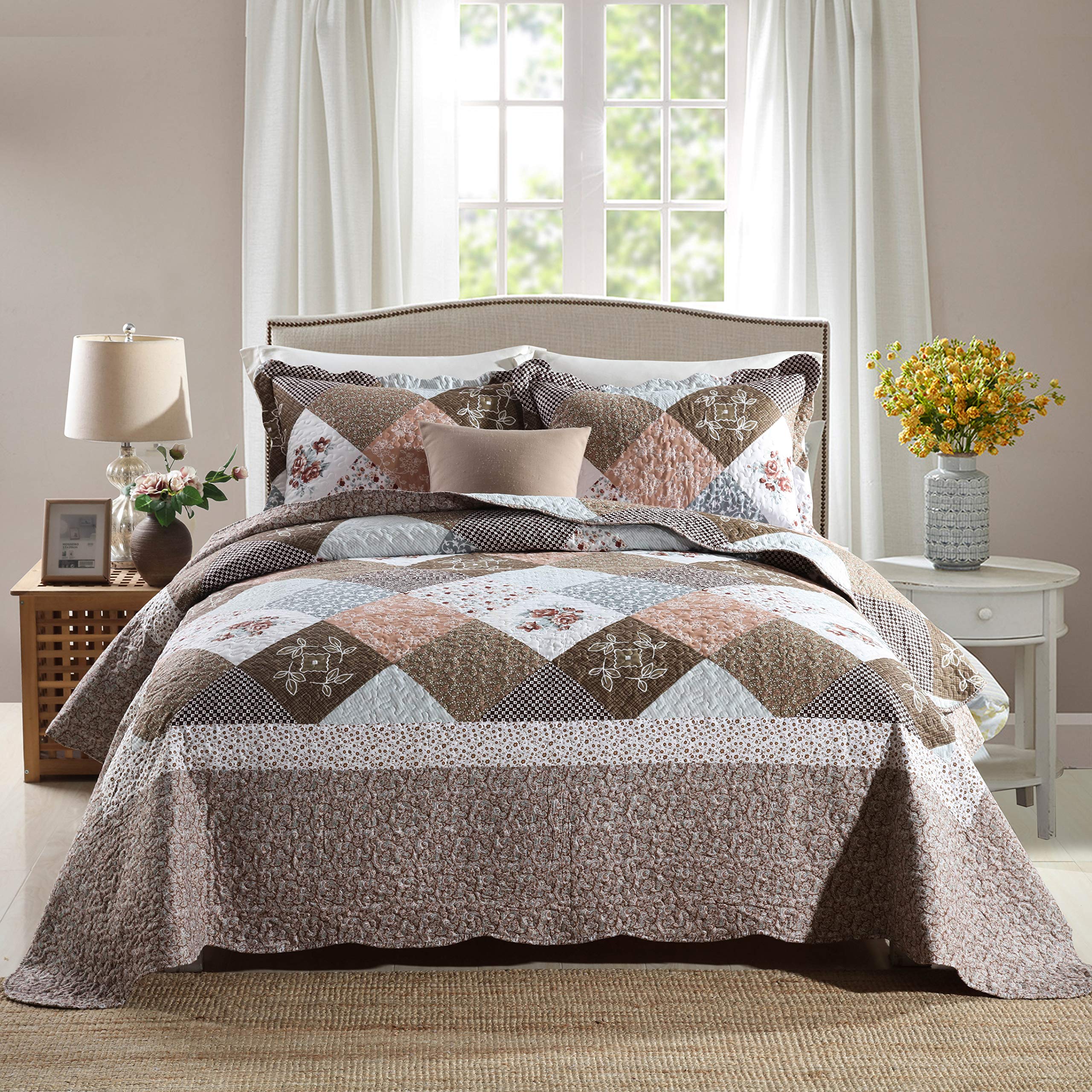 Travan quilt-queen-rose-floral-patchwork adds cozy focal point.