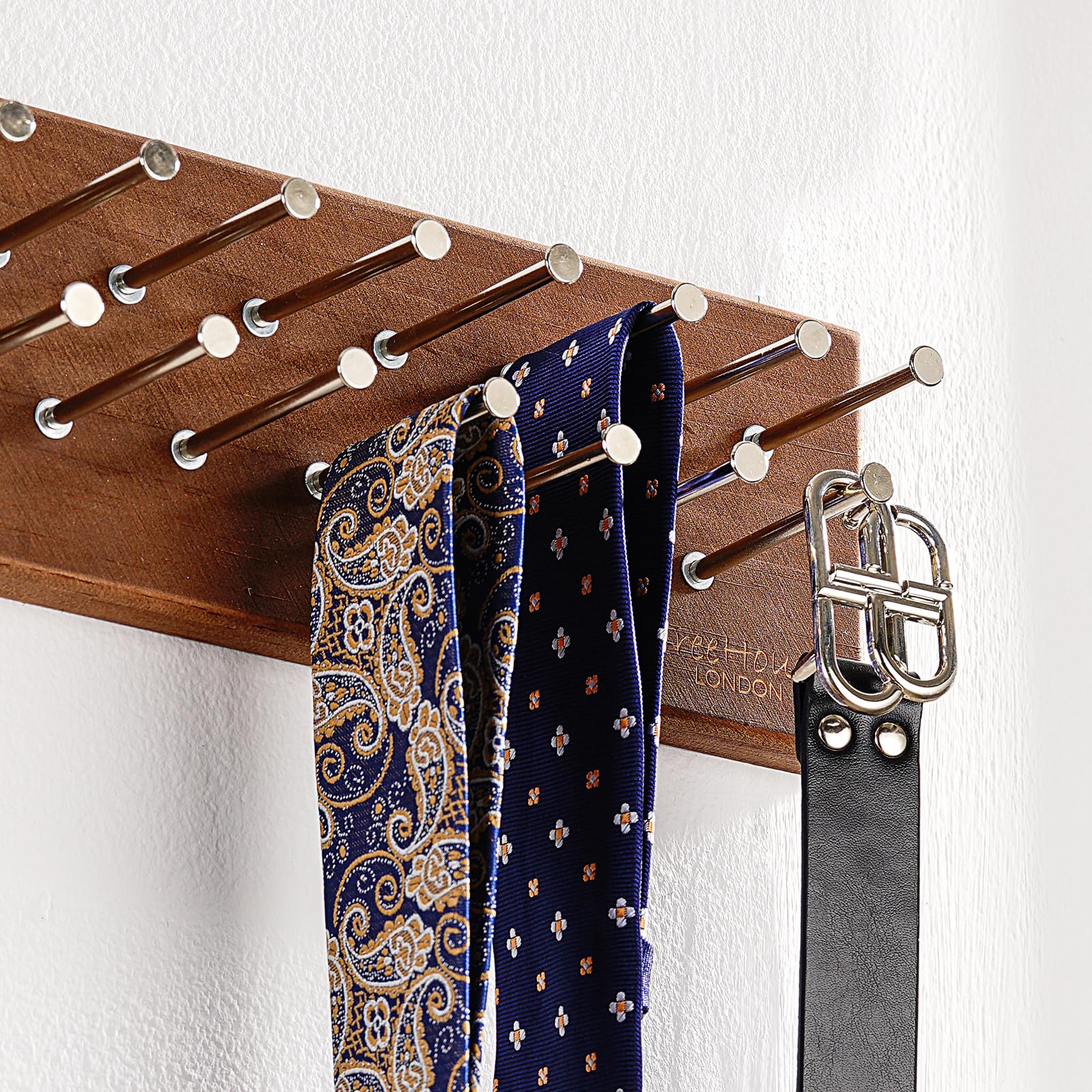 TreeHouse London wall-mounted design saves closet space and keeps ties within reach.