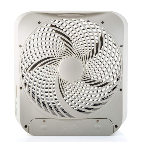 Treva 10-inch fan in travel or office setup offering two-speed cooling.