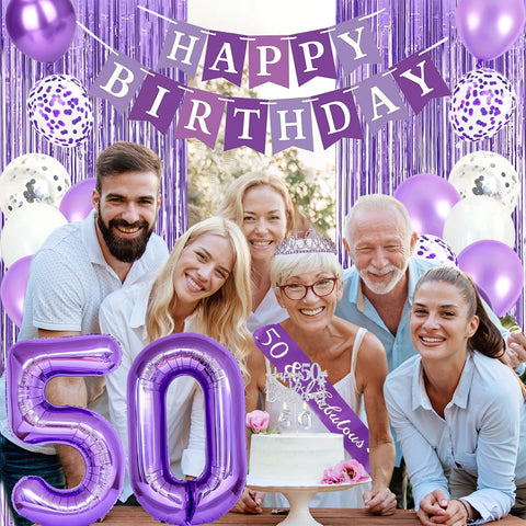Trgowaul 50th candle contributes a celebratory glow to the cake.
