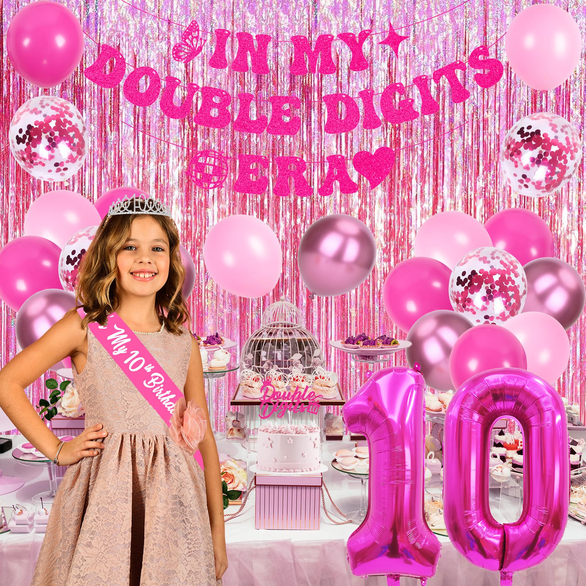 Trgowaul rose pink balloons create a cheerful backdrop.