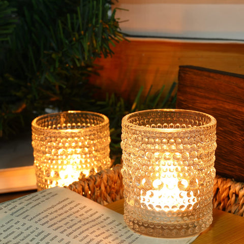 TRIRITE clear glass tea light holders elevate tables with warm, inviting glow.