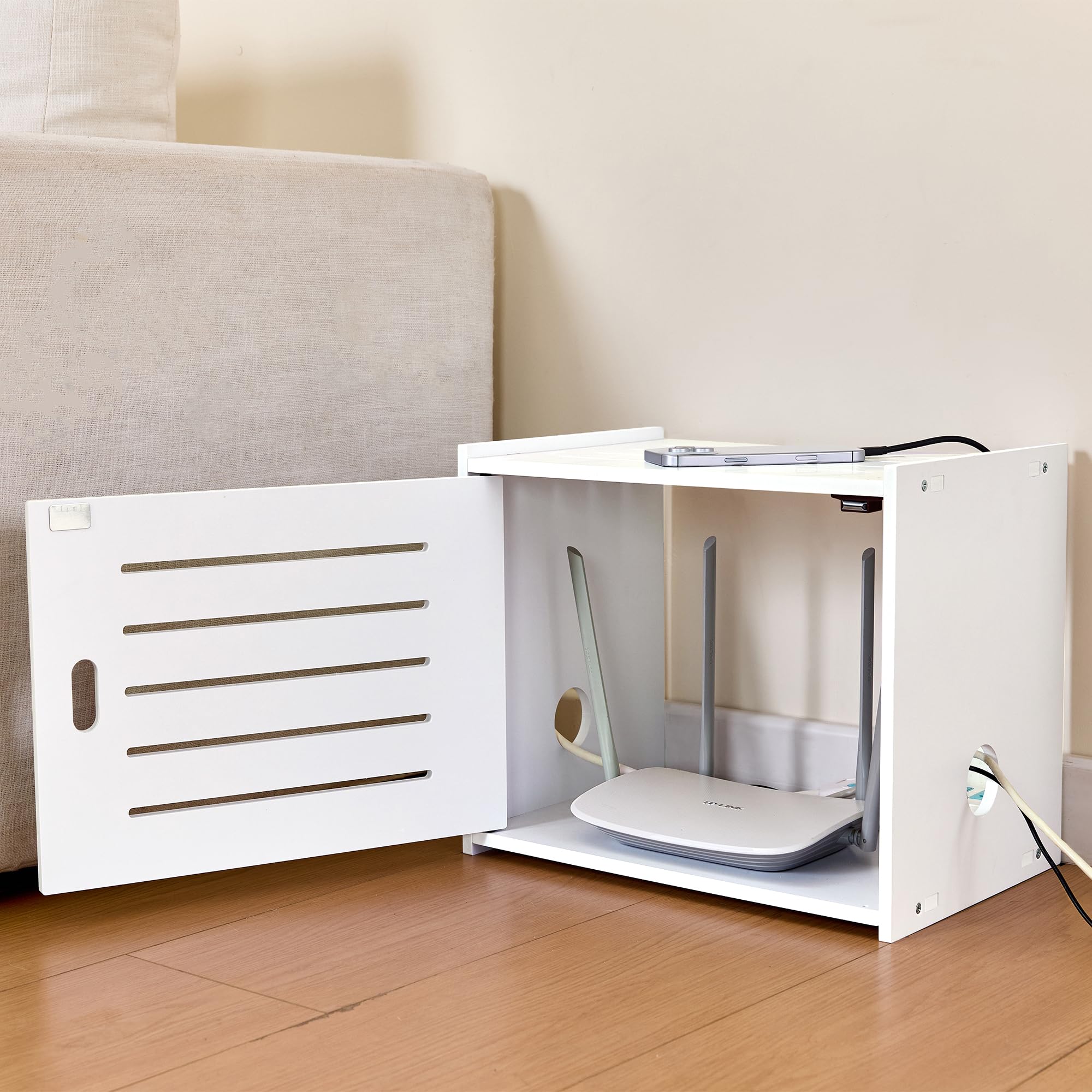 Tristcily router storage cabinet ventilation holes promoting airflow around devices.