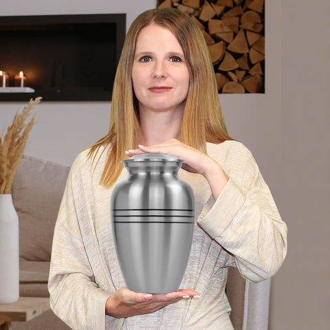 Trupoint Memorials urn with threaded lid provides secure ash storage.