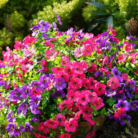 trytuny purple artificial flowers styling a front porch arrangement.
