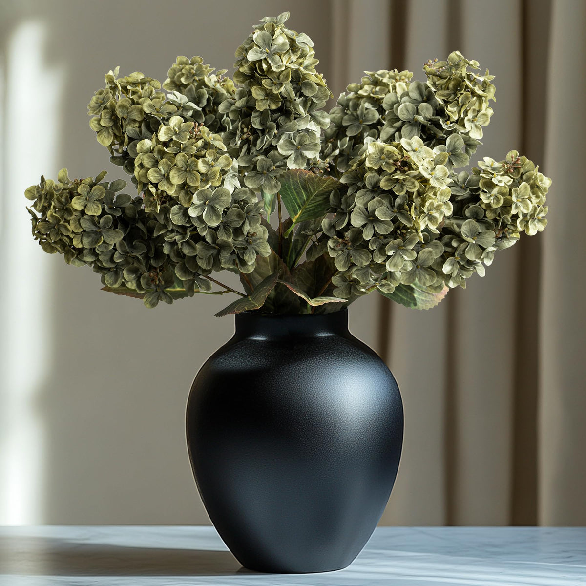 Ttranewsoo Green Hydrangea stem with 24-inch height for lifelike table displays.