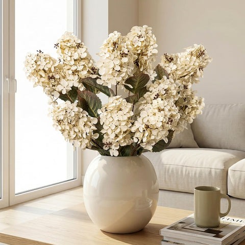 Cream-white hydrangea artificial flowers add lasting color to living spaces.