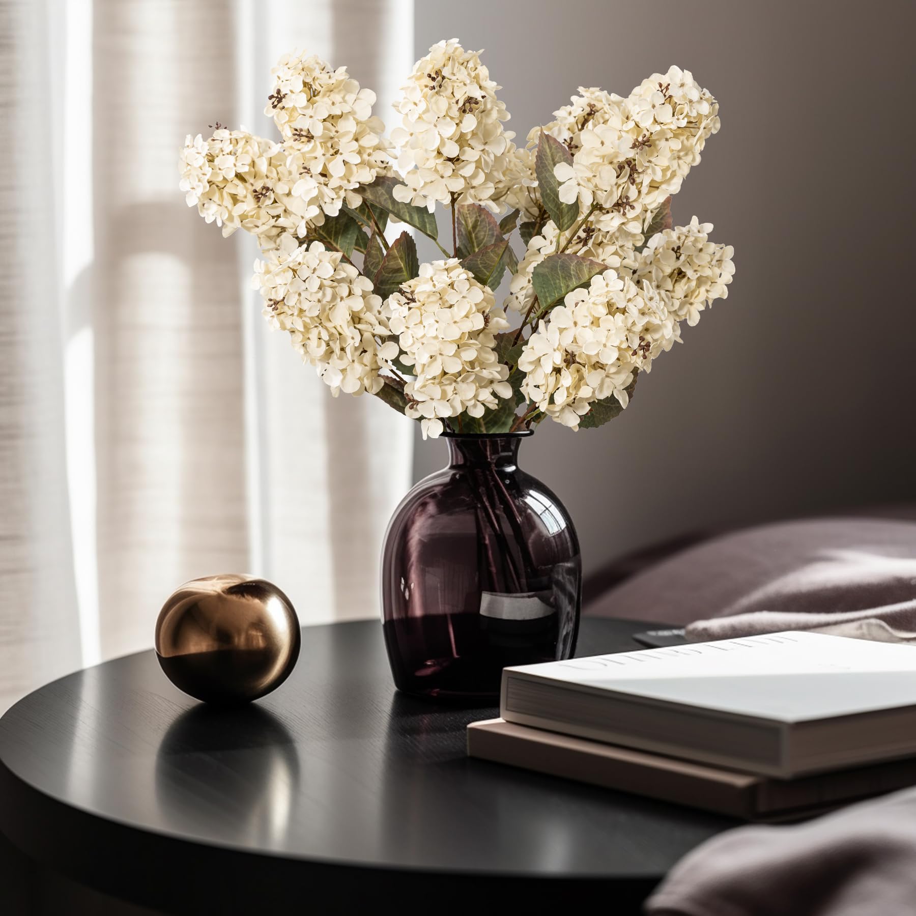 Ttranewsoo faux hydrangeas offer low-maintenance décor without watering.