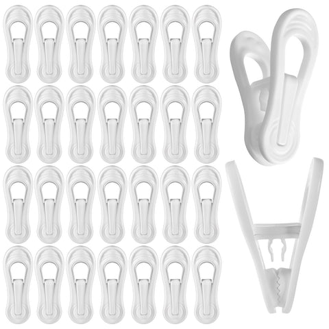 Tucnoeu 100-pack white plastic hanger clips securely hold baby clothes on lightweight hangers.