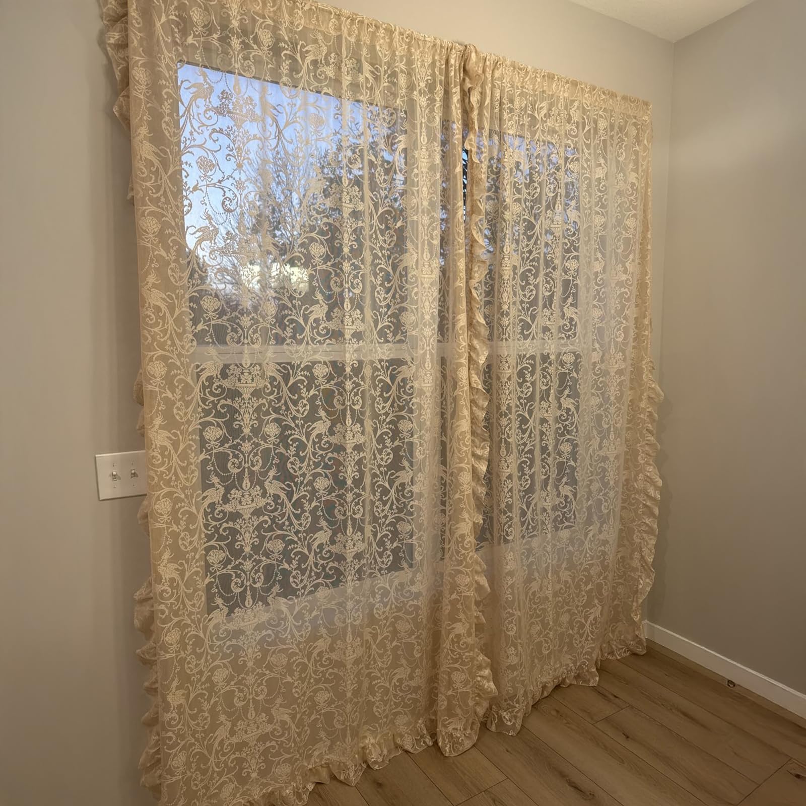 TUDECO light-filtering lace curtains diffuse sunlight while preserving privacy.