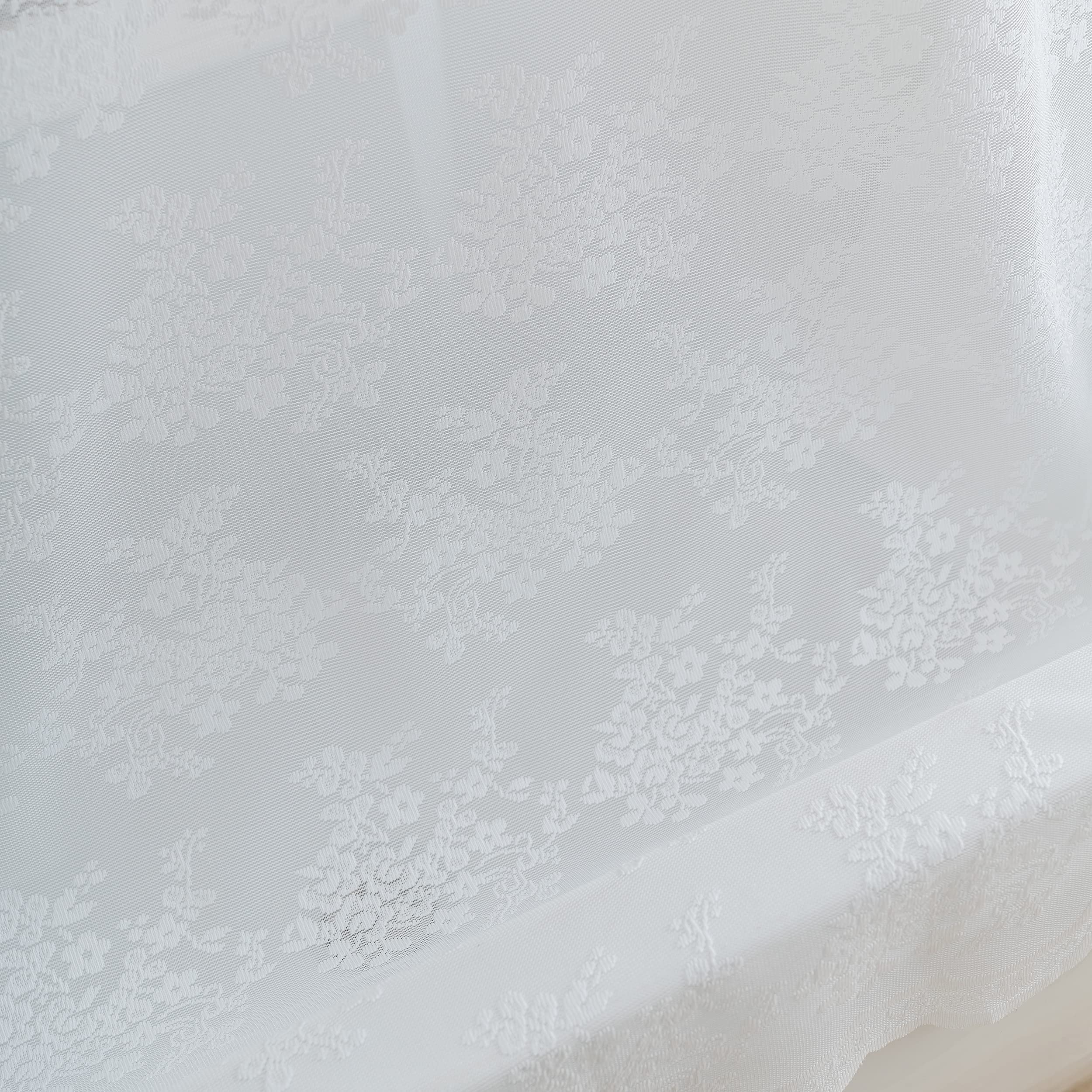 TUDECO sheer white lace creates a warm, welcoming atmosphere.
