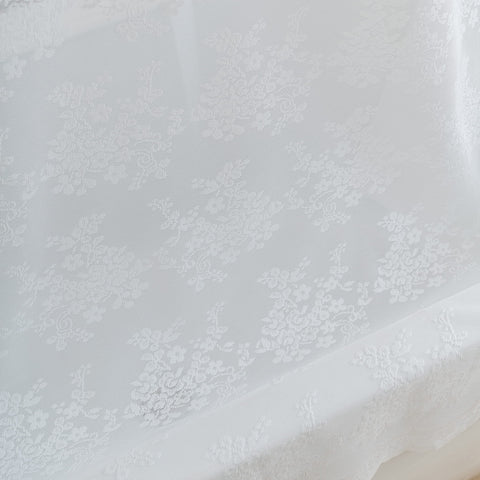 TUDECO sheer white lace creates a warm, welcoming atmosphere.
