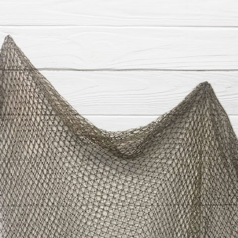 Tumbler Home fishing net decor 5x10 wall display for a coastal room backdrop.