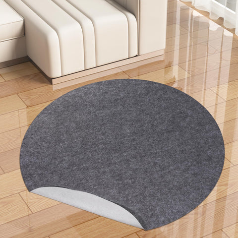 TUOTPE round rug pad 8ft waterproof underlayment keeps rugs secure on hardwood floors.