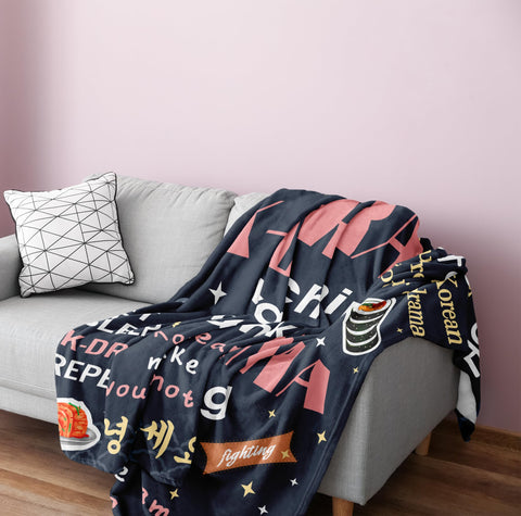 Turelos K-drama blanket lounging on sofa for relaxation.