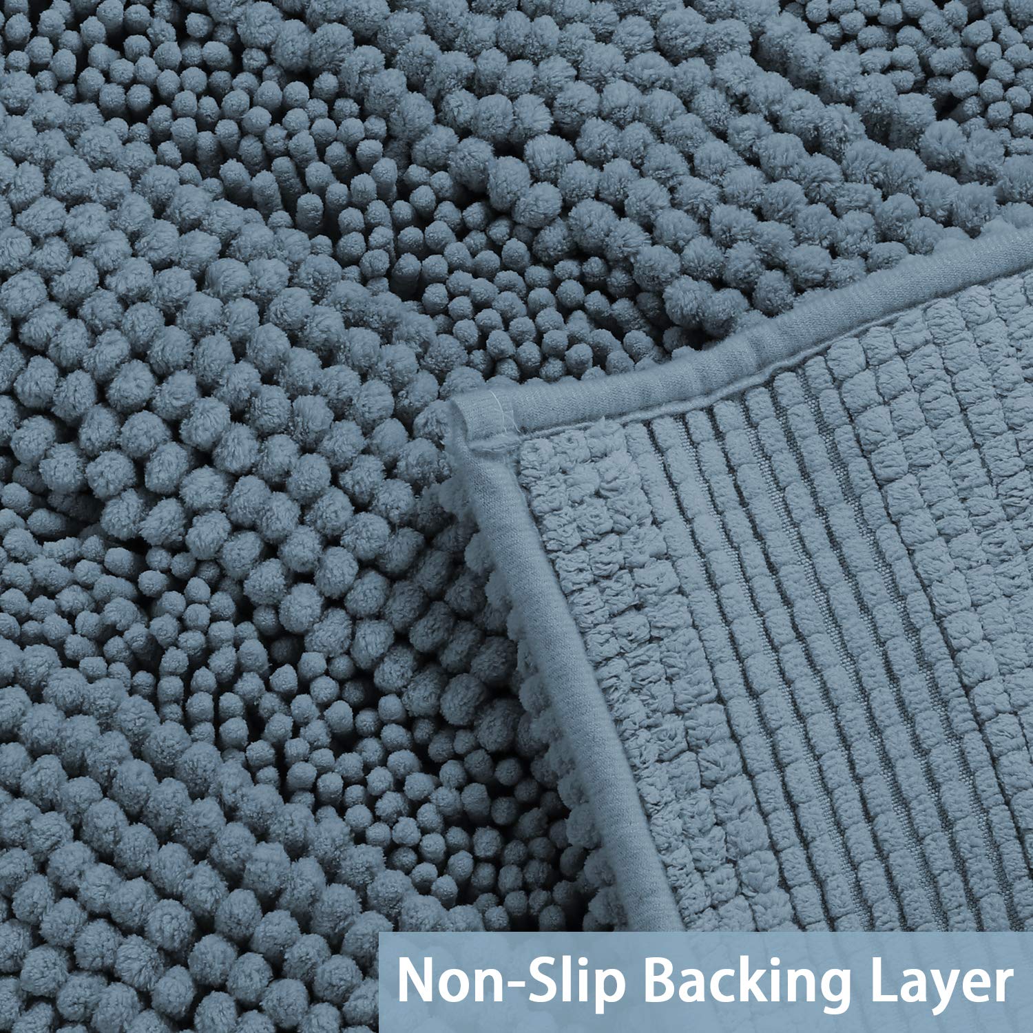 Turquoize bath mat with absorbent chenille pile for quick moisture handling.