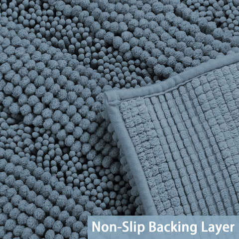 Turquoize bath mat with absorbent chenille pile for quick moisture handling.