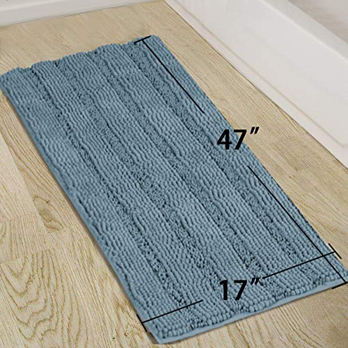 Turquoize bathroom mat positioned at the front of the sink for quick-dry comfort.