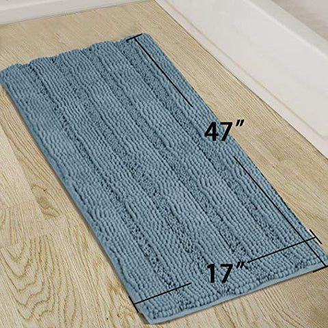 Turquoize bathroom mat positioned at the front of the sink for quick-dry comfort.