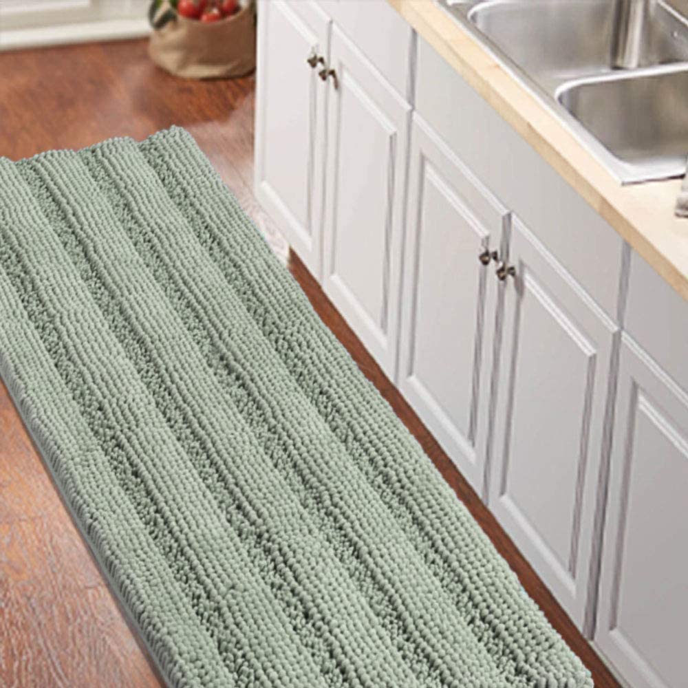 Turquoize non-slip chenille bathroom rug in sage adds safety and comfort.