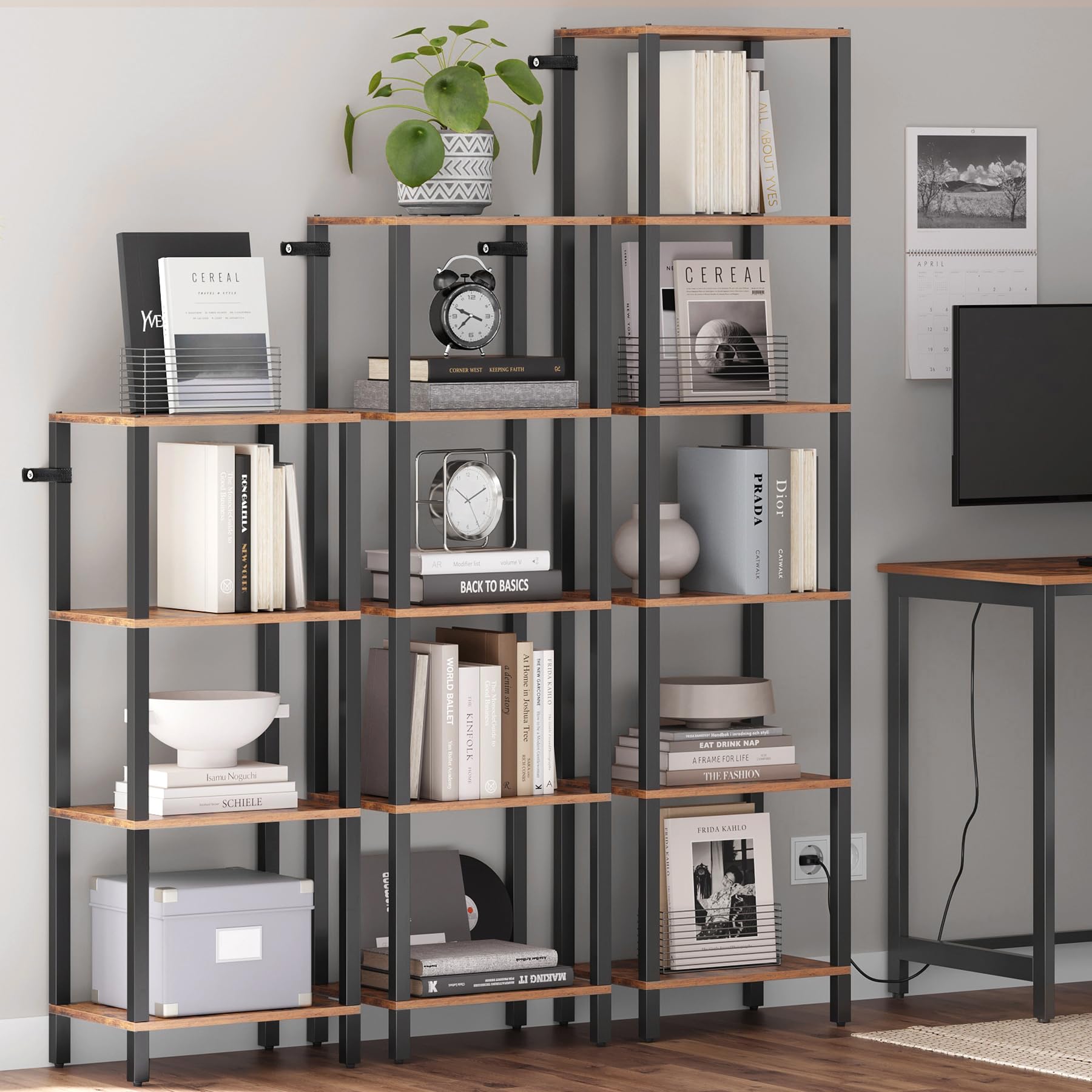 TUTOTAK Shelves organized with books, photos, and devices.