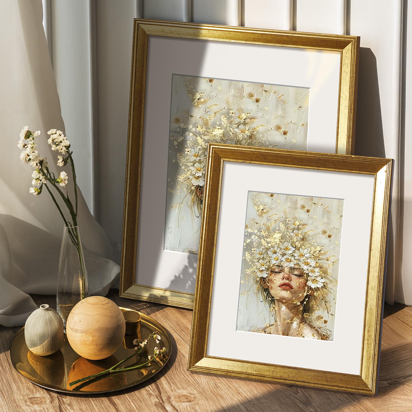 TWING frame with clear plastic cover protecting photos.