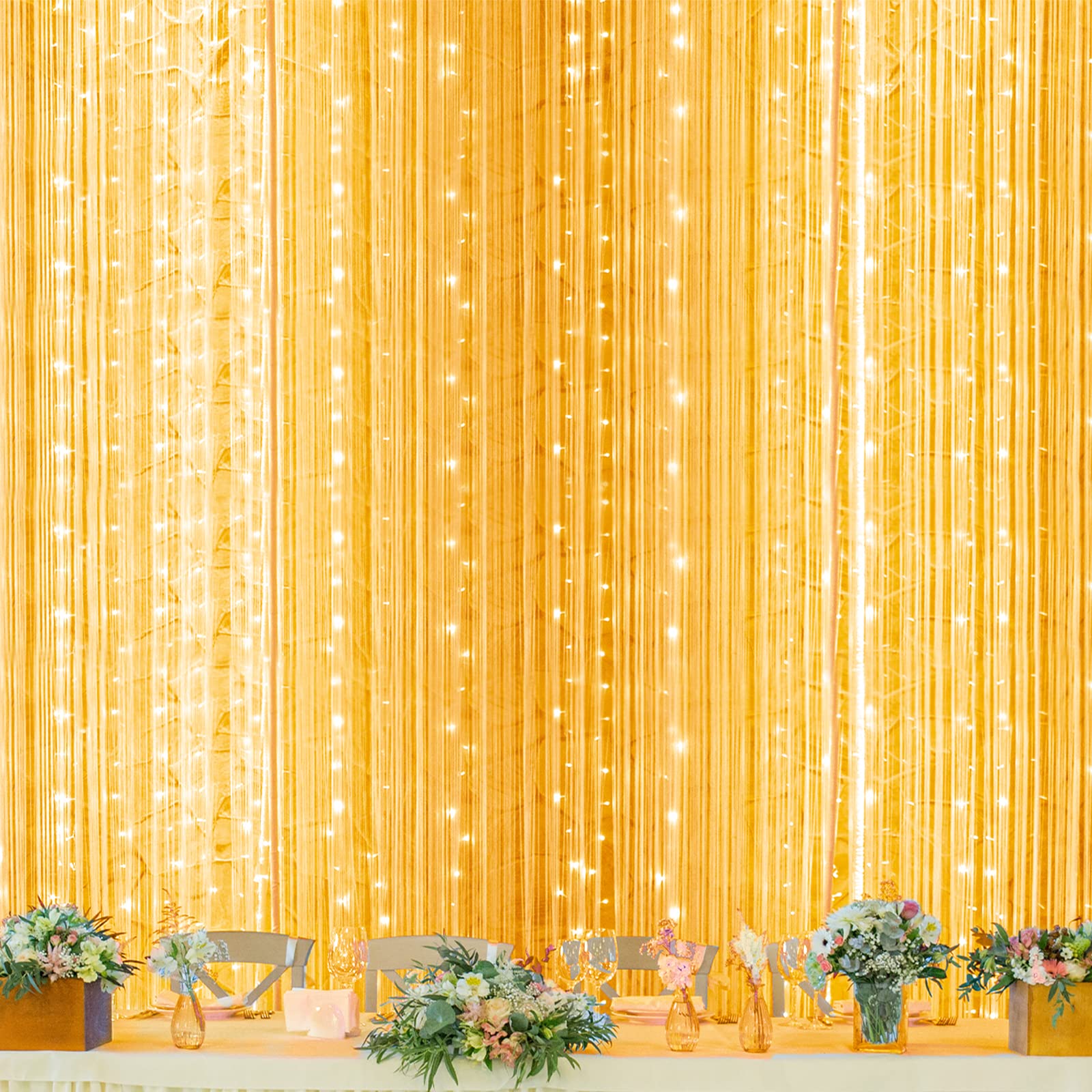 Twinkle Star 600 LED curtain lights on a window creating a magical festive ambiance.