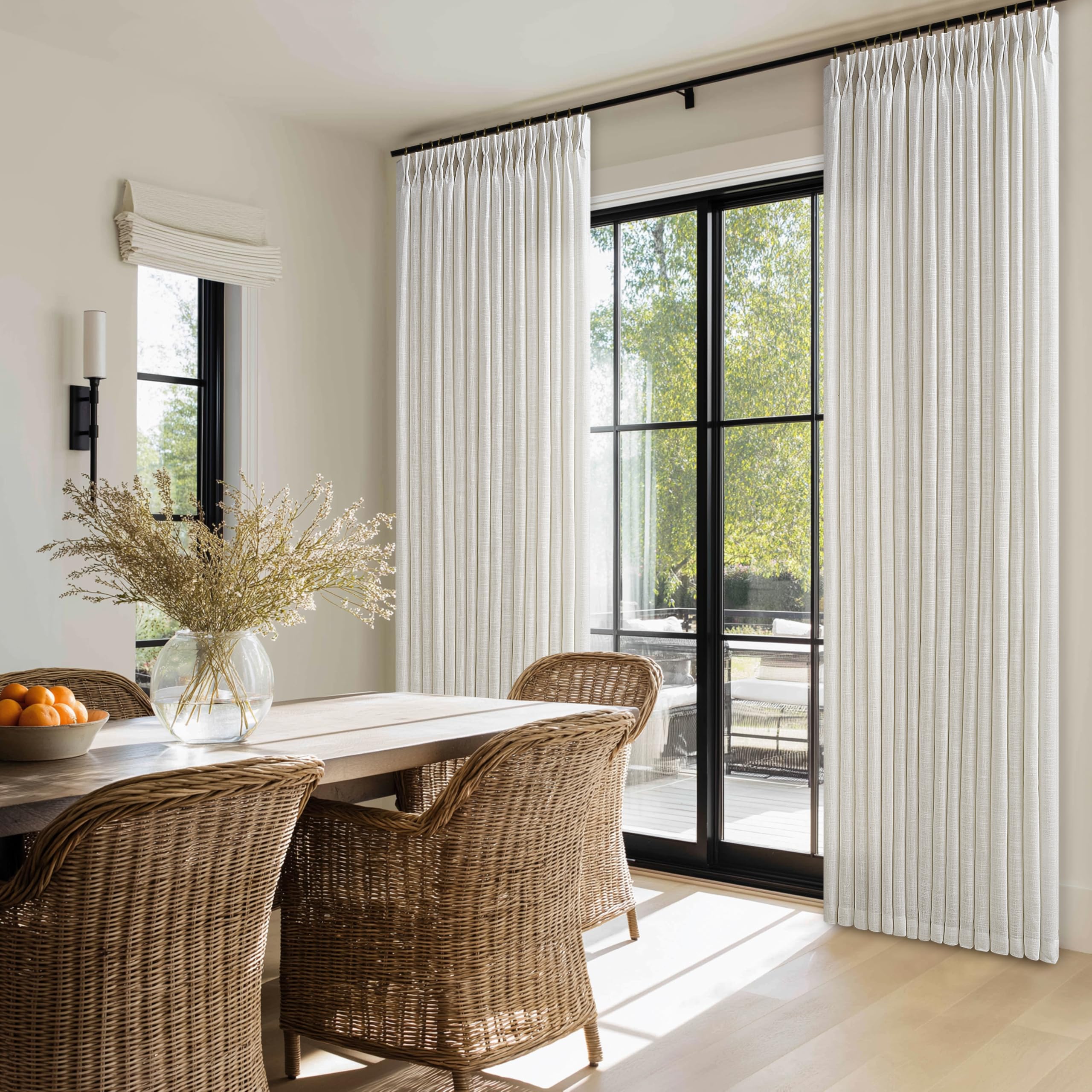 TWODRAPES dining room ambience curtain adds depth and warmth to space.