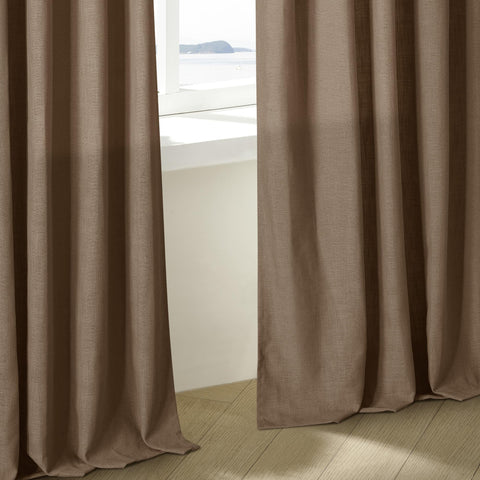 TWODRAPES ready-made two-panel curtains with hooks and rings included.