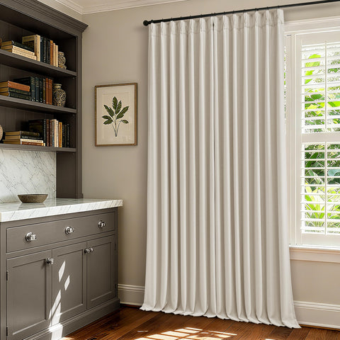 TWODRAPES room darkening setup helps create private, relaxing spaces for evening reading