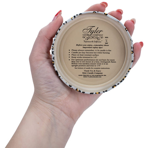 Tyler Candles Warm Sugar Cookie cozy room scene emphasizes inviting atmosphere