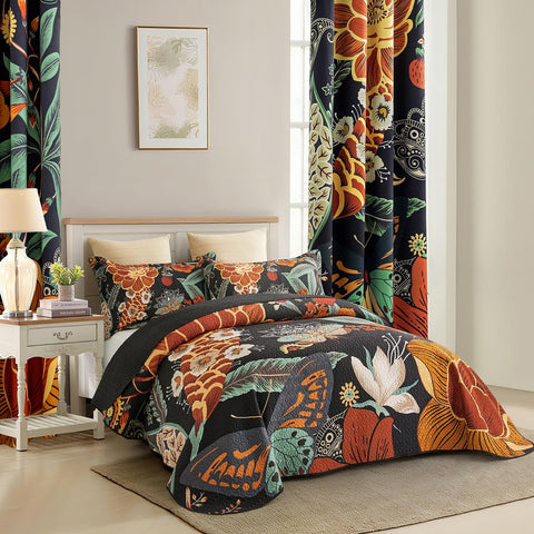 Reversible Tyrot quilt showing black floral design with two shams included