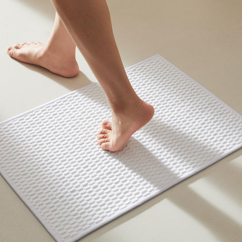 TYUU bathroom rug with non-slip backing grips smooth floors for safer steps.
