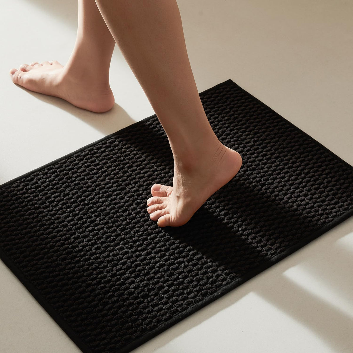 TYUU black bathroom rug 16x24 by the tub with non-slip grip for safe stepping