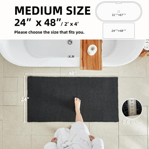 TYUU black rug laid flat showing full-room fit and style.