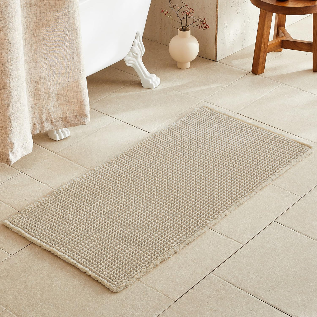 TYUU Pale Beige Bath Rug with waffle texture for plush post-shower comfort.