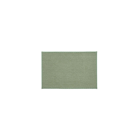 TYUU sage-green rug adds spa-like calm and cozy underfoot.