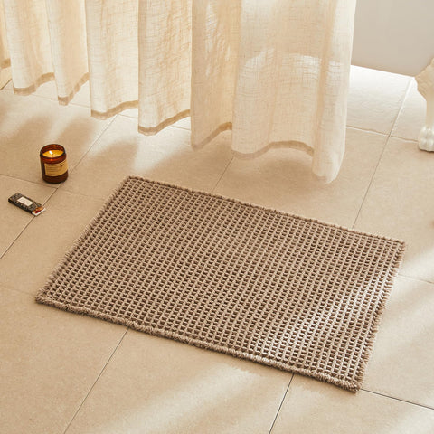 TYUU waffle bath mat in beige with plush texture and 30x20 size for cozy comfort.