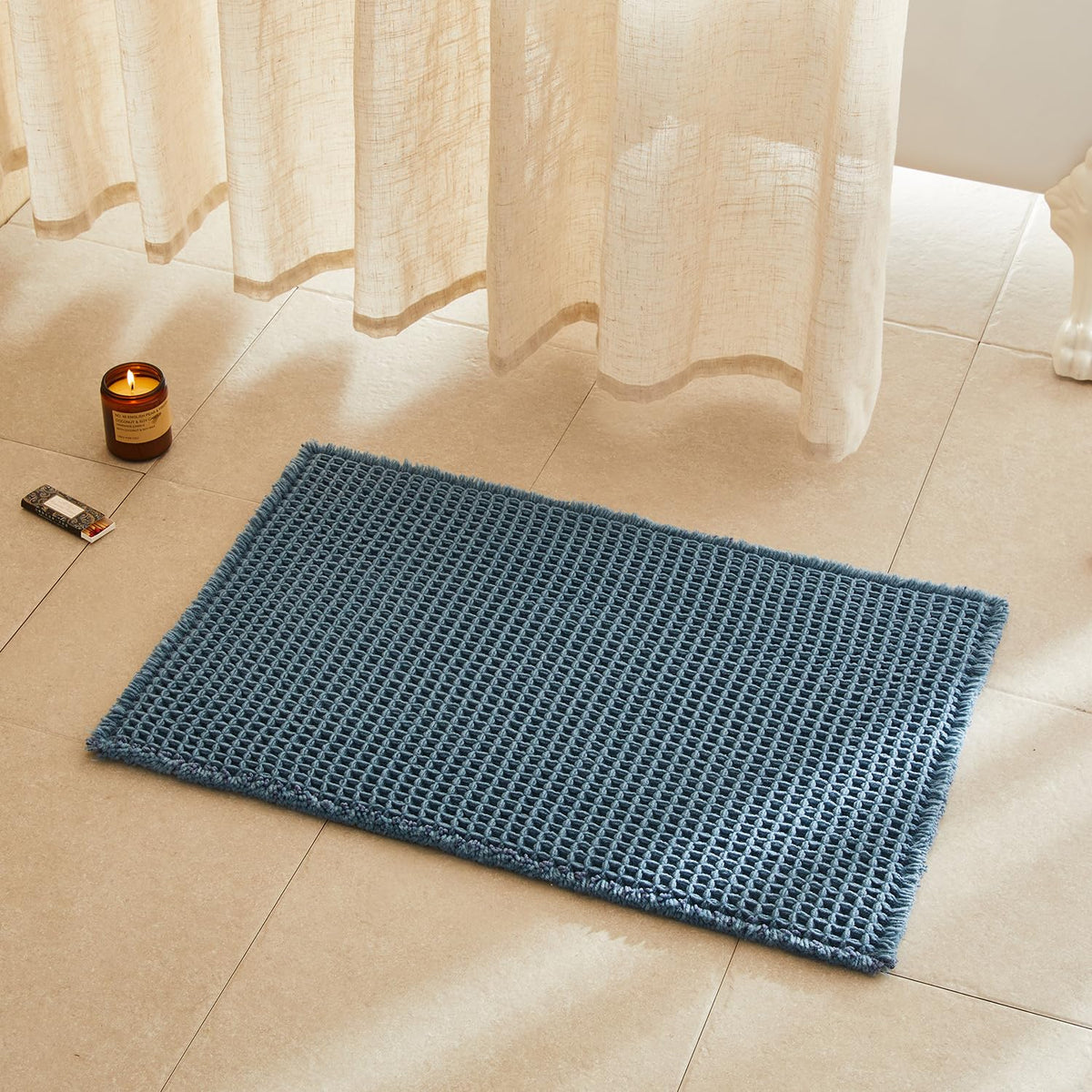 TYUU waffle bath mat denim blue front view showing cozy texture and soft color