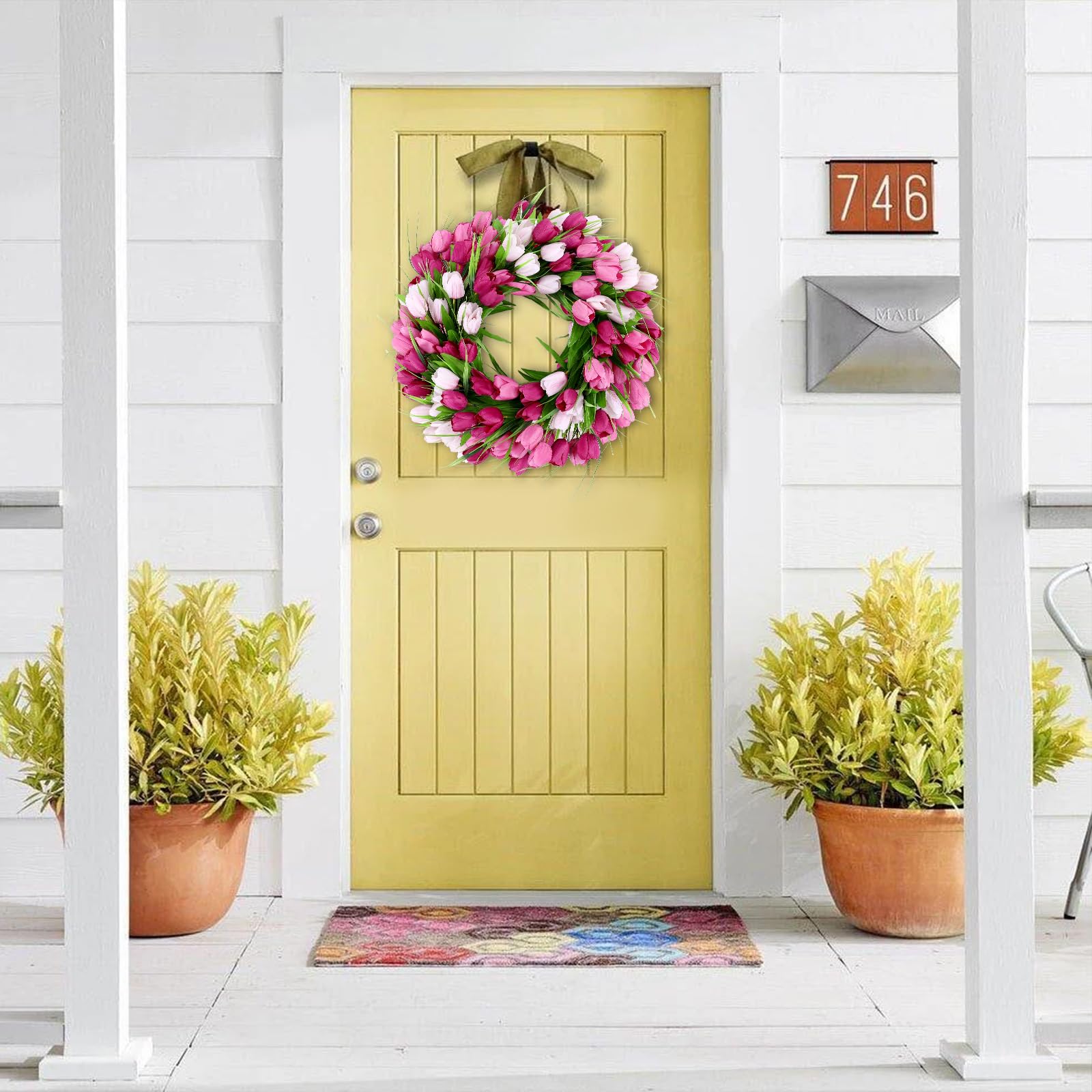 U'Artlines silk tulips and green leaves create a lifelike, low-maintenance wreath.