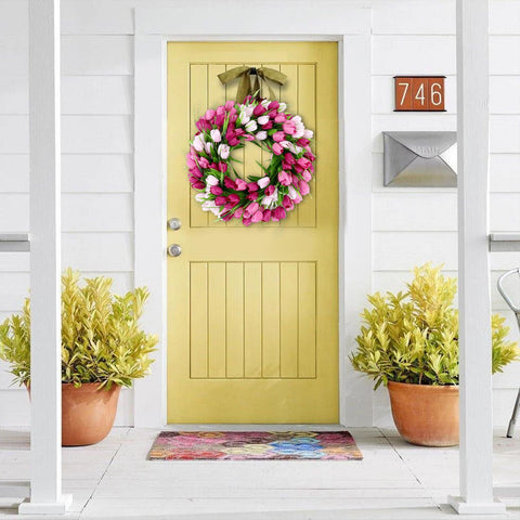 U'Artlines silk tulips and green leaves create a lifelike, low-maintenance wreath.