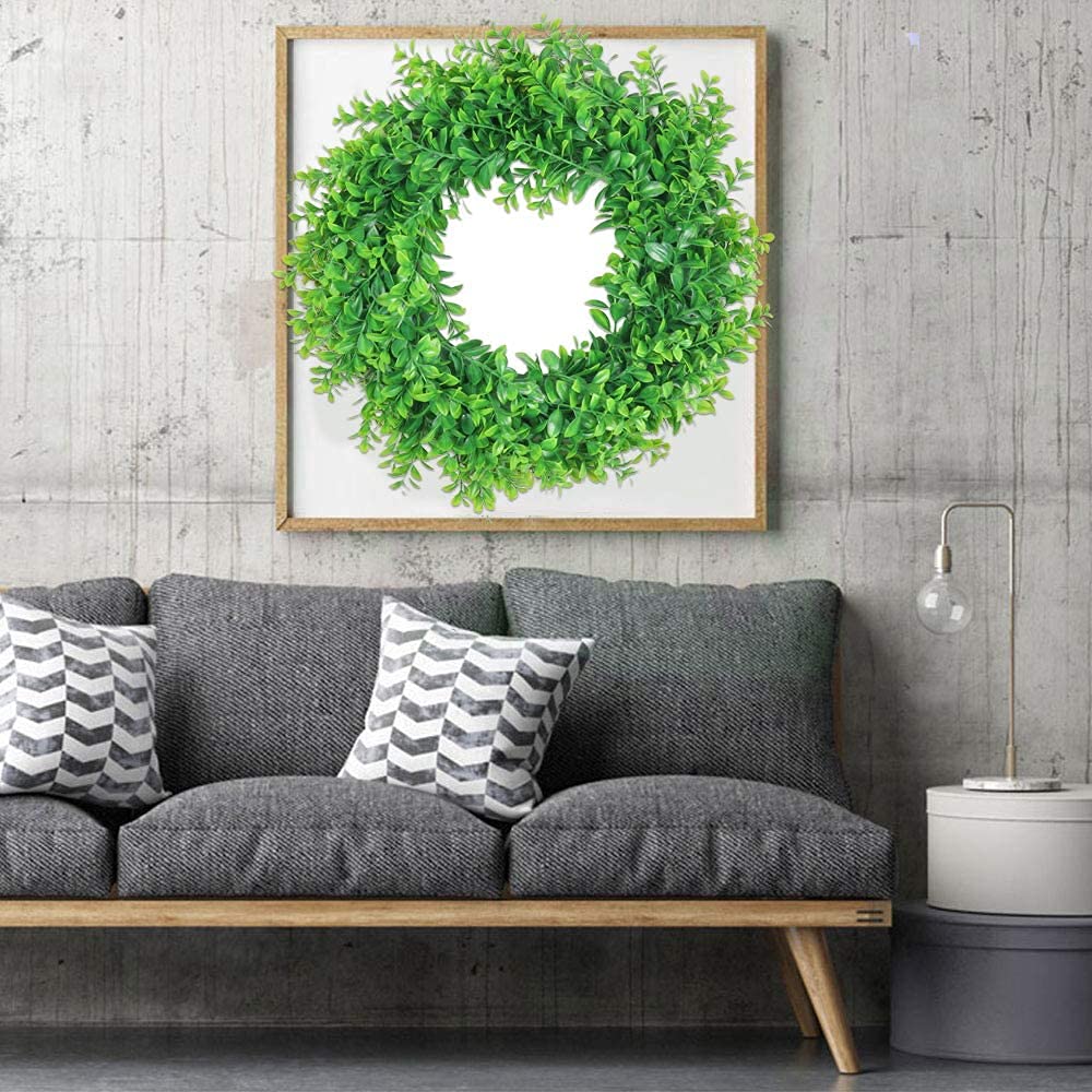 U'Artlines 17-inch wreath displayed on wall or window for versatile styling.